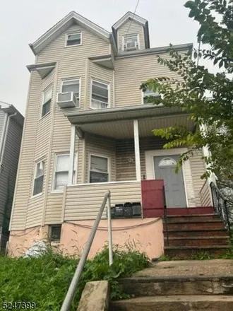 Buy this 9 bed house on 123 Johnson Avenue in Newark, NJ 07108