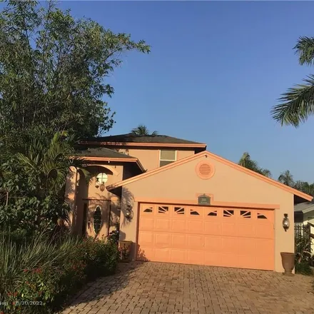 Buy this 3 bed house on 2384 Northwest 34th Way in Coconut Creek, FL 33066