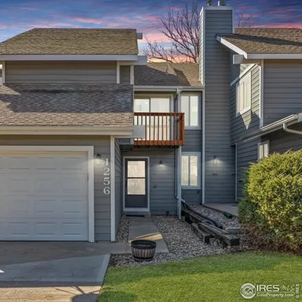 Buy this 3 bed townhouse on 1256 Atwood Court in Longmont, CO 80501