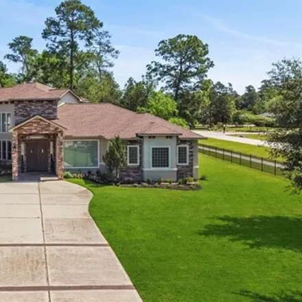Buy this 5 bed house on North Ossineke Drive in Montgomery County, TX