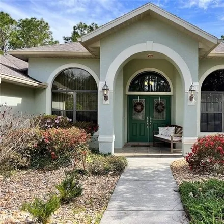Buy this 4 bed house on 2974 West Elm Blossom Street in Citrus County, FL 34465