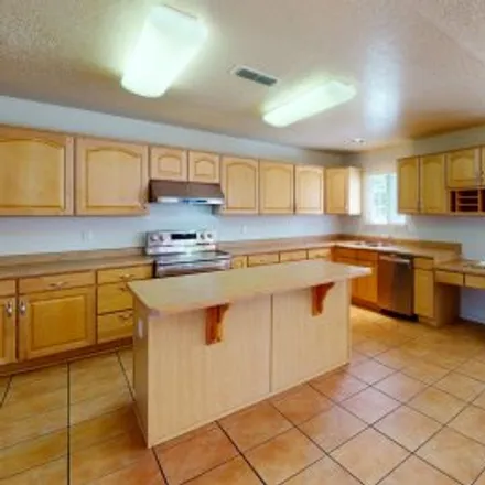 Buy this 4 bed apartment on 7612 Ramona Avenue Northwest in Northwest Albuquerque, Albuquerque