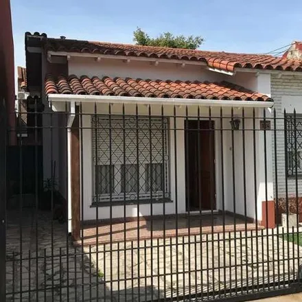 Buy this 4 bed house on Guardiamarina Enrique Py 314 in Adrogué, Argentina