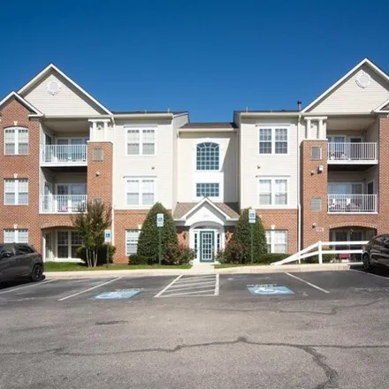 Buy this 2 bed condo on 2472 Amber Orchard Court West in Piney Orchard, MD 21113