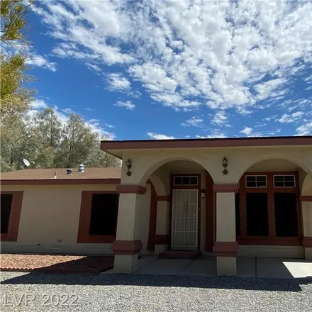 Buy this 3 bed house on 1900 Jeane Avenue in Pahrump, NV 89048