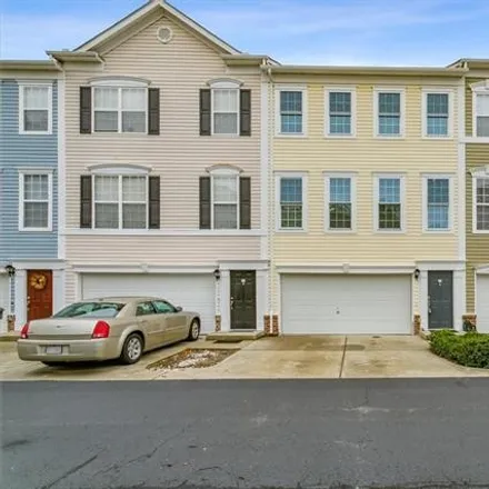 Buy this 4 bed townhouse on 559 Jessica Circle in Port Warwick, VA 23606