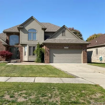 Rent this 4 bed house on 47145 Woodberry Estates Drive in Macomb Township, MI 48044
