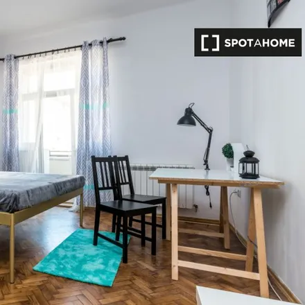 Rent this 4 bed room on Henryka Siemiradzkiego 10a in 60-763 Poznań, Poland