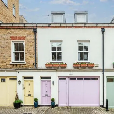 Buy this 4 bed townhouse on 20 Conduit Mews in London, W2 3BP