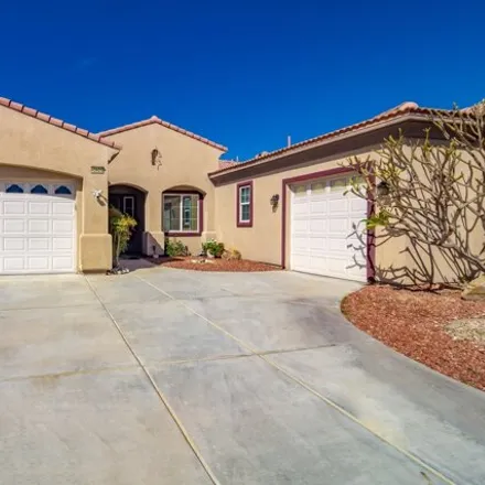 Rent this 4 bed house on 43407 Sentiero Boulevard in Indio, CA 92203