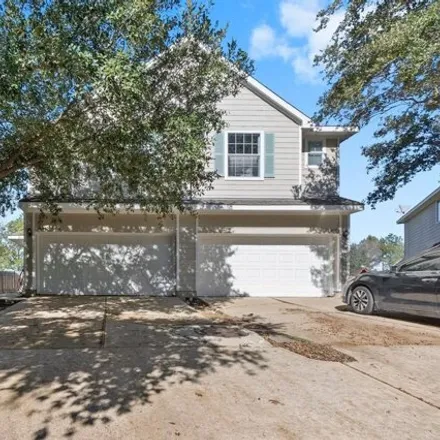 Rent this 3 bed townhouse on 17699 Olympic Park Lane in Harris County, TX 77346