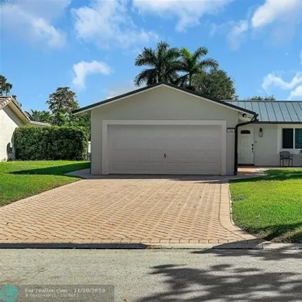 Buy this 3 bed house on 801 Northwest 87th Avenue in Coral Springs, FL 33071