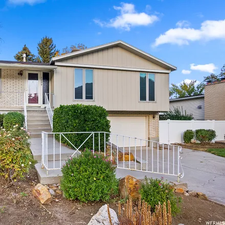Buy this 4 bed house on 2093 East Brewer Avenue in Cottonwood Heights, UT 84121