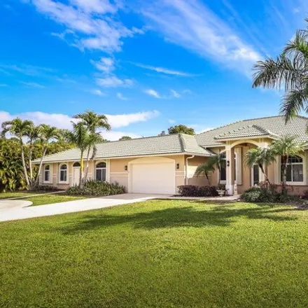 Buy this 5 bed house on 15250 75th Avenue North in Palm Beach County, FL 33418