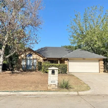 Rent this 4 bed house on 4090 Rush Springs Drive in Arlington, TX 76016