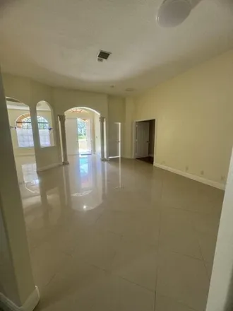 Rent this 4 bed house on 15817 Citrus Grove Boulevard in Palm Beach County, FL 33470