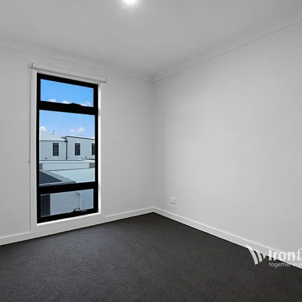 Rent this 4 bed townhouse on Commerce Lane in Mambourin VIC 3024, Australia