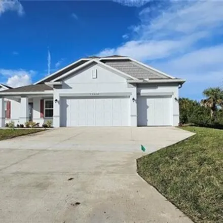 Rent this 4 bed house on 19000 Woodbine Avenue in Charlotte County, FL 33954