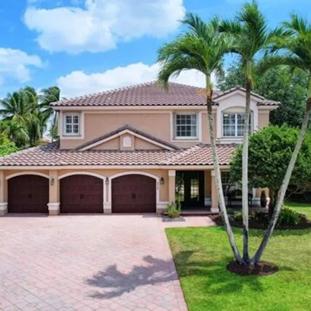 Buy this 4 bed house on 596 Cypress Crossing in Wellington, FL 33414