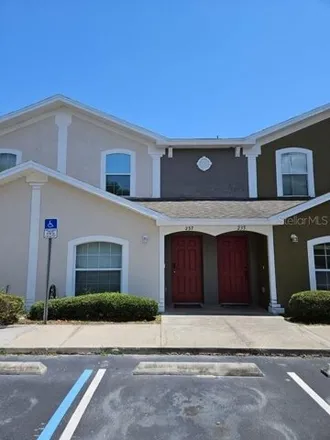 Buy this 3 bed townhouse on 237 Royal Palm Drive in Buenaventura Lakes, FL 34743