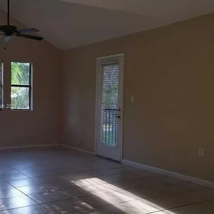 Rent this 2 bed apartment on 10441 Southwest 156th Court in The Hammocks, Miami-Dade County