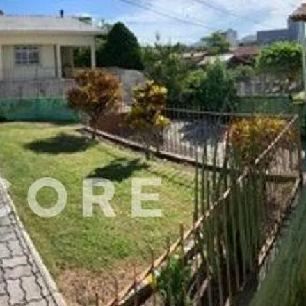 Buy this 4 bed house on Servidão da Garoa in Ingleses do Rio Vermelho, Florianópolis - SC