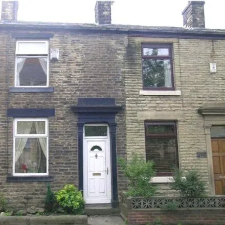 Rent this 2 bed townhouse on Spar in Newhey Road, Milnrow