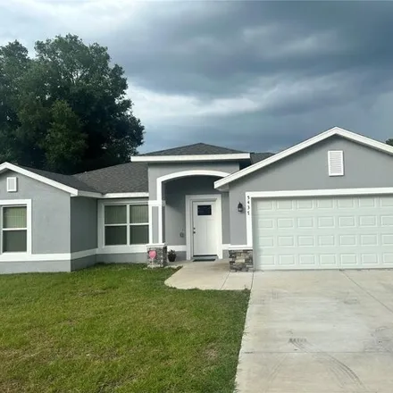 Rent this 3 bed house on 5487 Pecan Road in Marion County, FL 34472