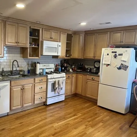 Rent this 4 bed condo on 4 Gardner Rd Unit 2 in Cambridge, Massachusetts