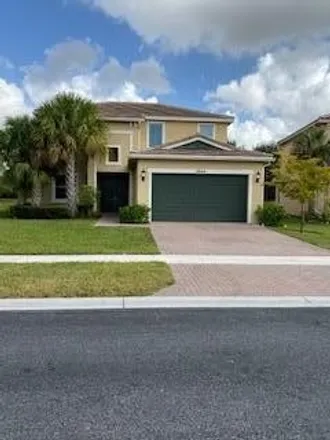 Rent this 4 bed house on 2980 Bellarosa Circle in Royal Palm Beach, Palm Beach County