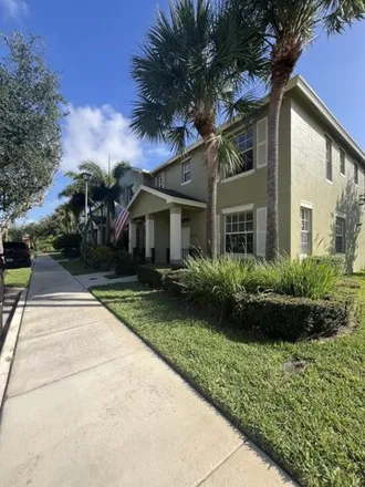 Rent this 3 bed townhouse on 2073 SE Glen Ridge Dr in Port Saint Lucie, Florida