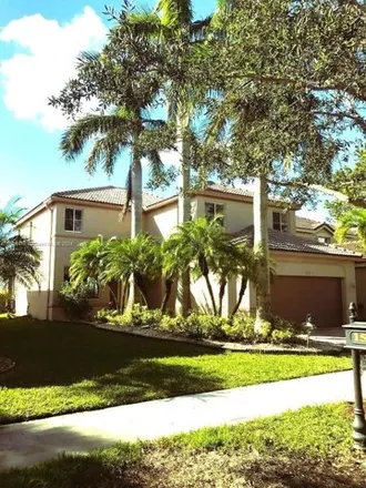 Buy this 5 bed house on 1587 Winterberry Lane in Weston, FL 33327