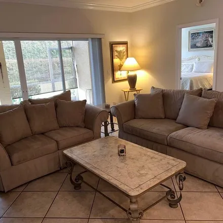 Rent this 2 bed apartment on 28615 Carriage Homes Drive in Carriage Homes at Woods Edge, Bonita Springs
