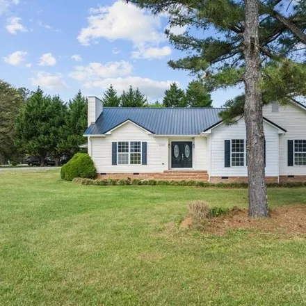 Buy this 4 bed house on 5344 Randleman Road in Guilford County, NC 27406