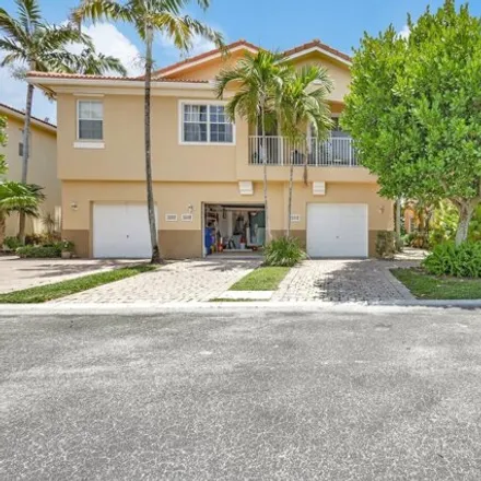 Buy this 2 bed house on 3220 Mirella Drive in Riviera Beach, FL 33404