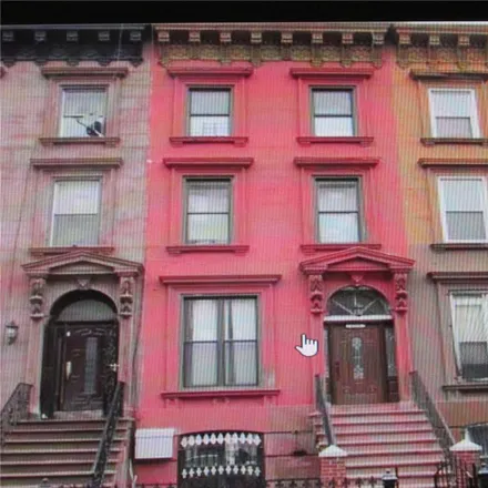 Buy this 6 bed townhouse on 589 Greene Avenue in New York, NY 11216