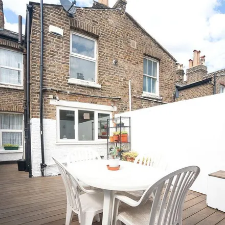 Rent this 3 bed townhouse on 176 Kilburn Lane in Kensal Town, London