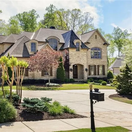 Buy this 7 bed house on 15951 Manor Club Drive in Alpharetta, GA 30004