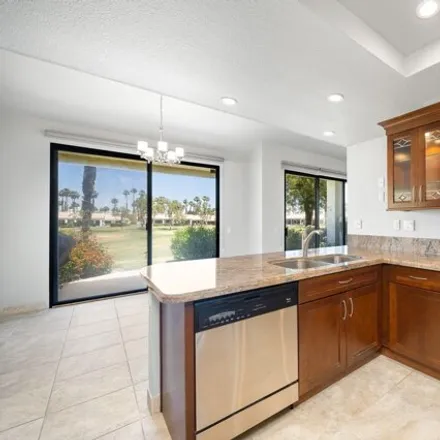 Rent this 3 bed condo on Arnold Palmer Golf Course (PGA West) in PGA Boulevard, La Quinta