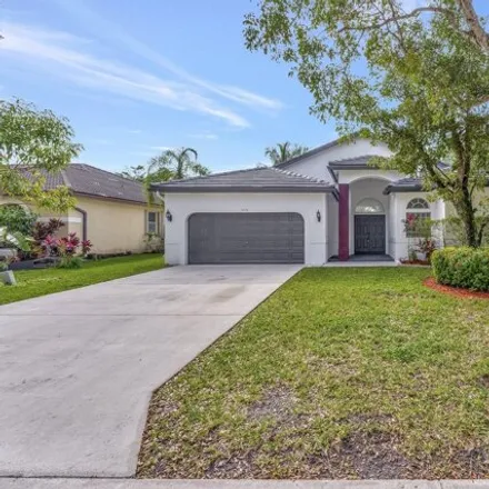 Buy this 4 bed house on 5587 Northwest 57th Way in Coral Springs, FL 33067