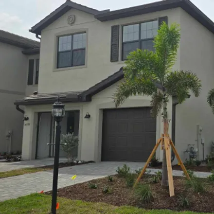 Rent this 3 bed townhouse on 14787 Lyla Terrace