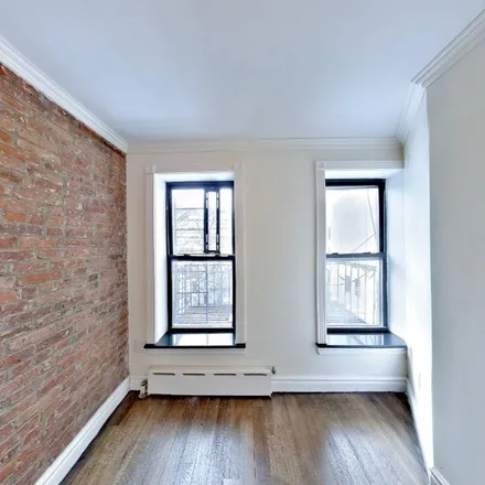 Rent this 4 bed apartment on 409 West 51st Street in New York, NY 10019