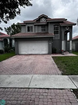 Buy this 4 bed house on 300 Northwest 107th Avenue in Pembroke Pines, FL 33026