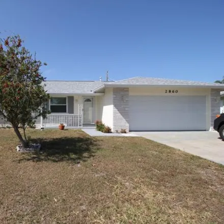 Rent this 3 bed house on 2900 Chartres Avenue West in Melbourne, FL 32935