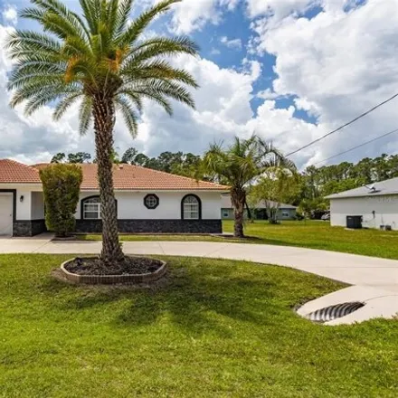 Buy this 4 bed house on 67 Reybury Lane in Palm Coast, FL 32164
