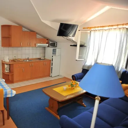 Rent this 1 bed apartment on 21403 Općina Sutivan