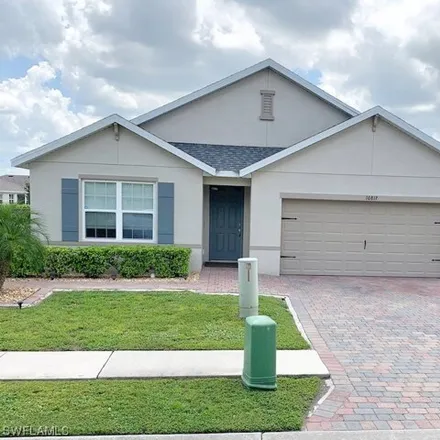 Buy this 4 bed house on 10825 Marble Brook Boulevard in Lehigh Acres, FL 33936