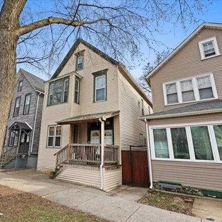 Buy this 6 bed house on 2521 West Palmer Street in Chicago, IL 60647