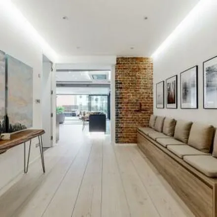 Rent this 2 bed apartment on Dickens Court in 13-16 Britton Street, London