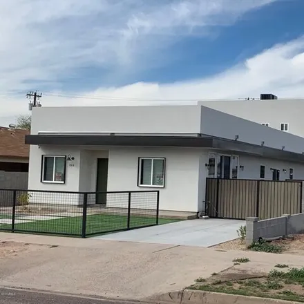 Rent this 3 bed house on 1014 E Fillmore St Apt 2 in Phoenix, Arizona